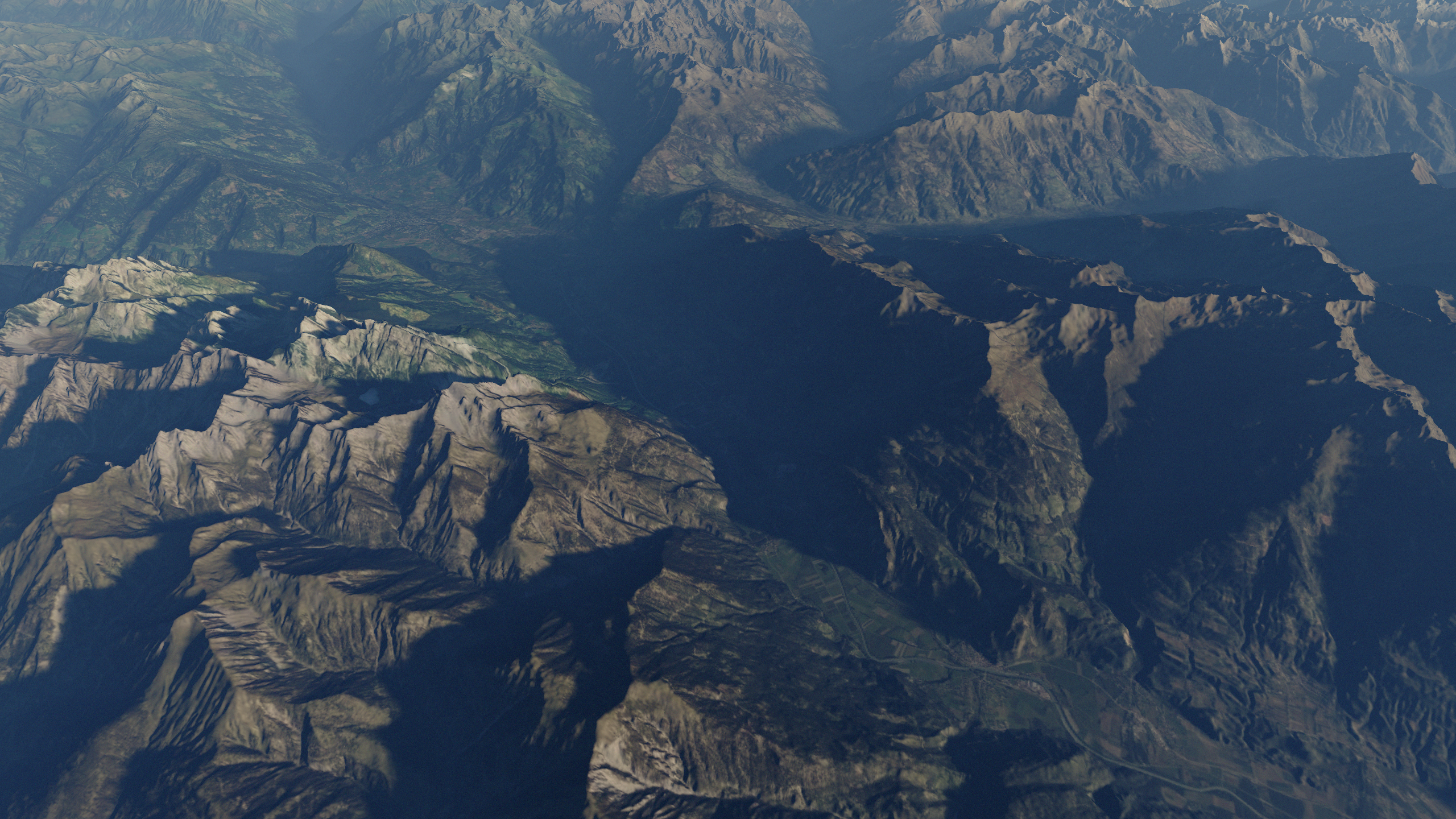 terrain shadows cast across a valley